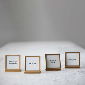 Gold frame with easel and saying