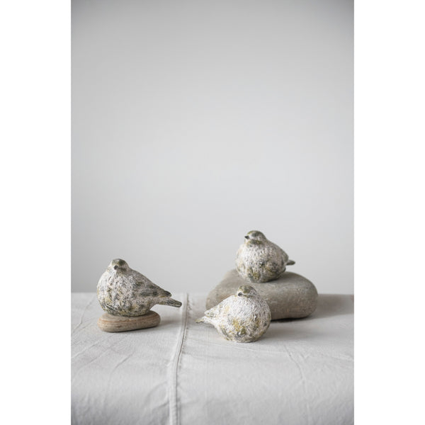 Resin bird with cement moss finish